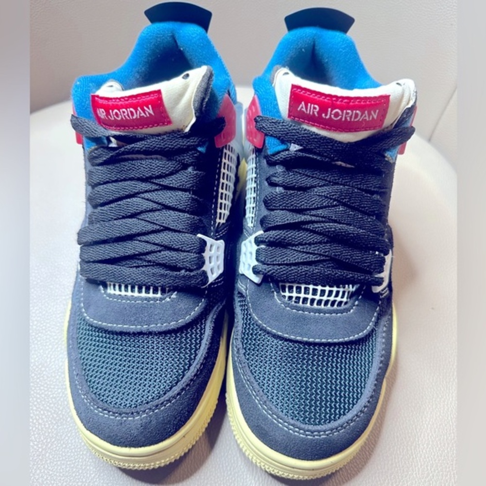 Air Jordan Sneakers with Blue and Red Accents